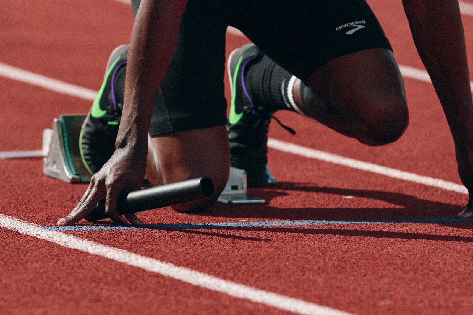 Athlete on a red rubberized running track